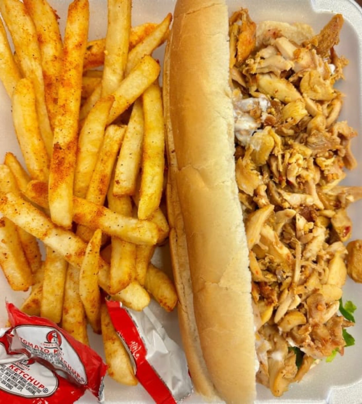 Chicken sub with seasoned fries