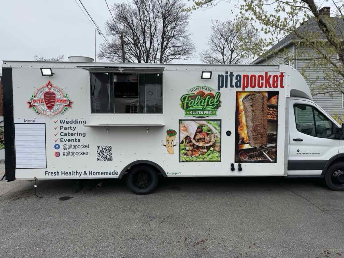 Pita Pocket food truck angle view with shawarma and falafel branding